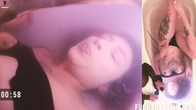 Watch this sexy brunette get soaked in her own pee in the bathtub