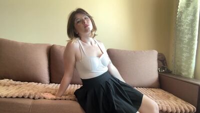 Beautiful student in a skirt stroking her body ????