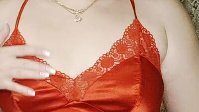 redheaded girl in a sexy red dress