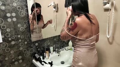 He fucks her in the hotel bathroom