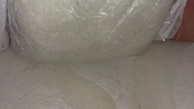 Babe fills up diaper with piss until it overflows out the side