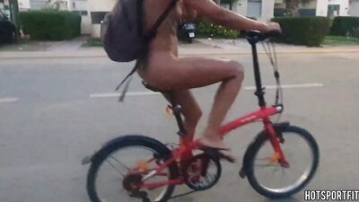 Wild Girl Biking Nude on Public Road: Flaunting Her Body and Pussy!
