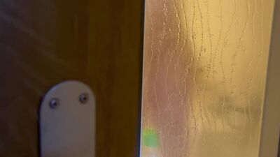 Exhibitionist wife's shower before New Year's Eve. Hot milf caught playing with her dildo.