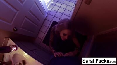 Pornstar Sarah Jessie gives a BJ in the bathroom