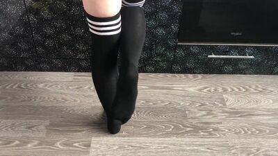 teen girl show her college knee high black socks