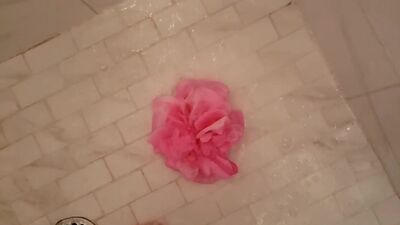 The Queen playing in bubbles cleaning feet